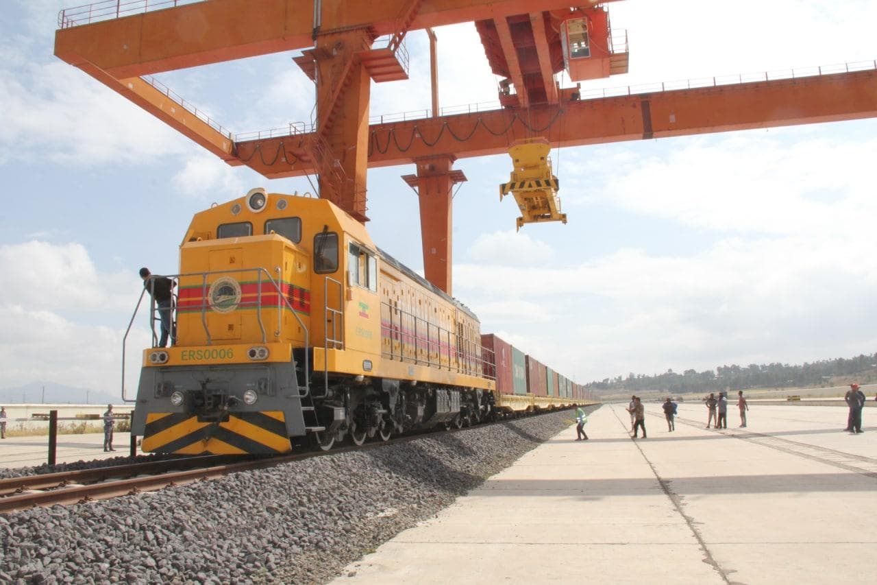 Rail freight containers being handled along the Ethiopian railway.